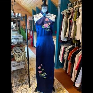 Custom made, blue gown embellished with pink lotus flower motif.